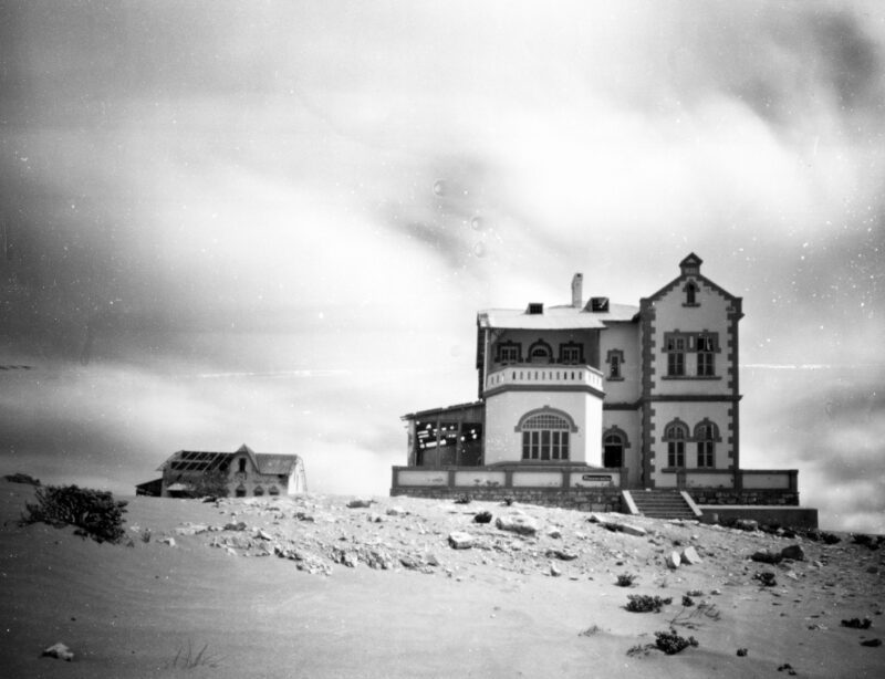 The Mine Manager's House in the abandoned ghost town of Kolmanskop, Namibia, photographed in black and white with an 8×10 pinhole camera.
