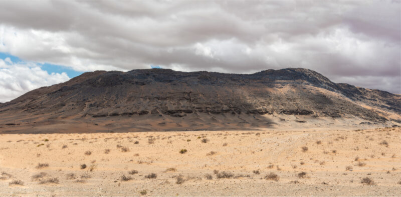 Panoramic desert escarpment and sparse vegetation near Rosh Pinah on the boundaries of the Richtersveld