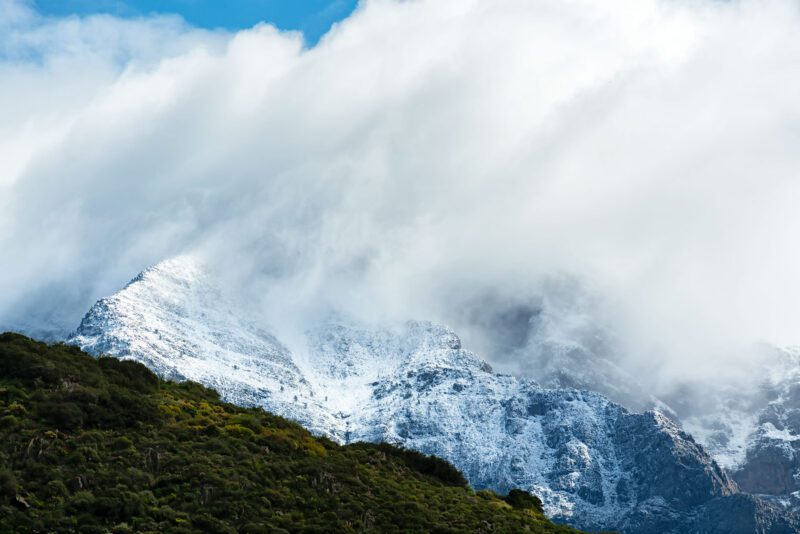 Pillars of Peace: Brandwacht Valley in Winter’s Grasp – snow-covered South African mountain landscape with green hills. Original Nikon digital and film photography, captured with a variety of high-quality professional cameras. Medium format film images shot with professional cameras, including Pentax 645, Pentax 6x7, Mamiya 645, Fuji GX617 panoramic, Rollei, and Yashica Mat. Large format film images created using professional pinhole cameras, as well as Shen-Hao 4x5, 4x10, 5x7, and 8x10 film cameras, featuring film stocks from Adox, Bergger, Fomapan, Fuji, Ilford, Kodak, Rollei, and Shanghai GP3. All photography and copyrights by CFP Prints & Craig Fouché Photography.
